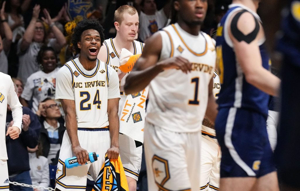 UC Irvine Anteaters guard Jurian Dixon (24) yells one excitement Thursday, April 3, 2025, during the National Invitational Tournament at Hinkle Fieldhouse in Indianapolis.