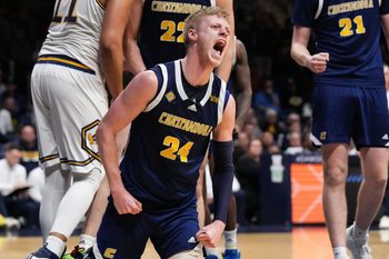 Chattanooga Mocs forward Garrison Keeslar (24) yells in excitement Thursday, April 3, 2025, during the National Invitational Tournament at Hinkle Fieldhouse in Indianapolis.
