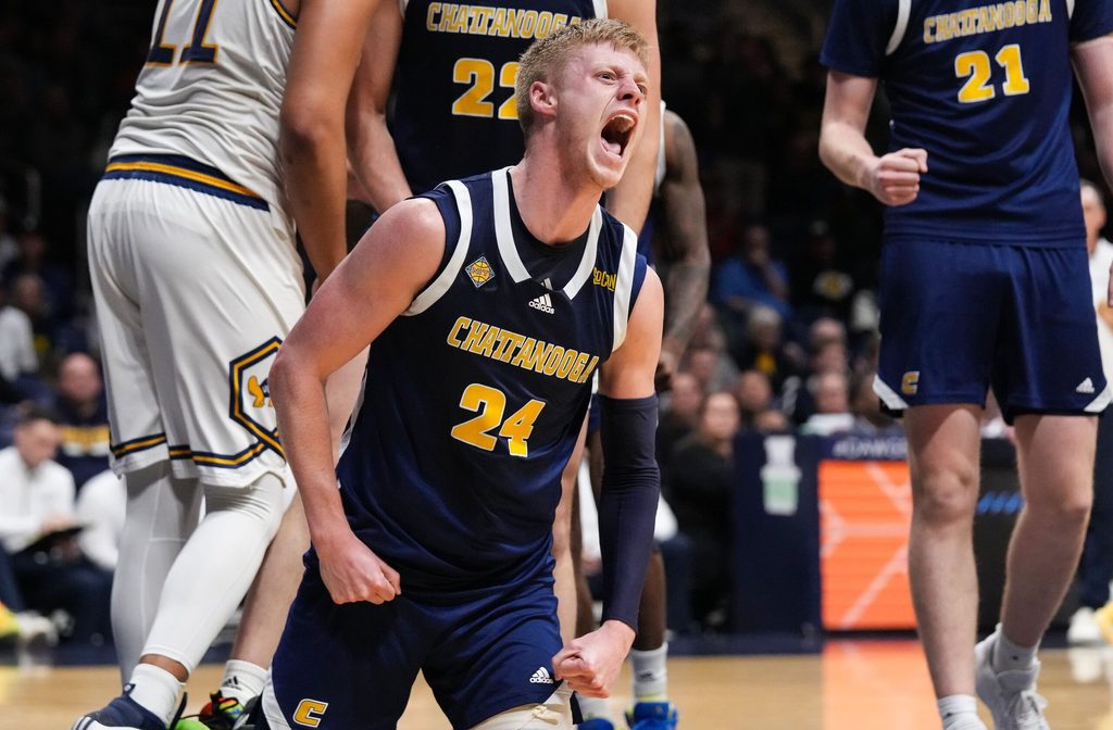 Chattanooga Mocs forward Garrison Keeslar (24) yells in excitement Thursday, April 3, 2025, during the National Invitational Tournament at Hinkle Fieldhouse in Indianapolis.
