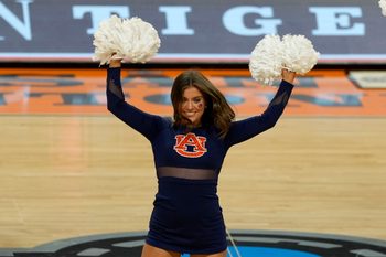 Apr 5, 2025; San Antonio, TX, USA; The Auburn Tigers cheerleaders perform during the first half in the semifinals of the men's Final Four of the 2025 NCAA Tournament at Alamodome. Mandatory Credit: Scott Wachter-Imagn Images
