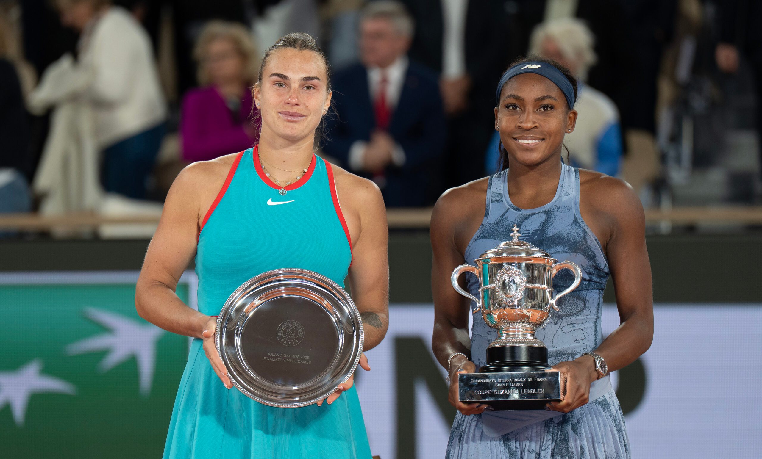 Jun 7, 2025; Paris, FR;  Coco Gauff of the United States poses with Aryna Sabalenka after their match on day 14 at Roland Garros Stadium. Mandatory Credit: Susan Mullane-Imagn Images