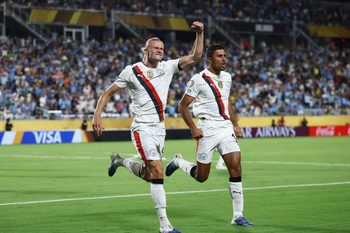 [Subscription Customers Only] Jun 30, 2025; Orlando, Florida, USA; Manchester City forward Erling Haaland (9) celebrates scoring their second goal with midfielder Rodri (16) during a round of 16 match of the 2025 FIFA Club World Cup at Camping World Stadium. Mandatory Credit: Lee Smith-Reuters via Imagn Images