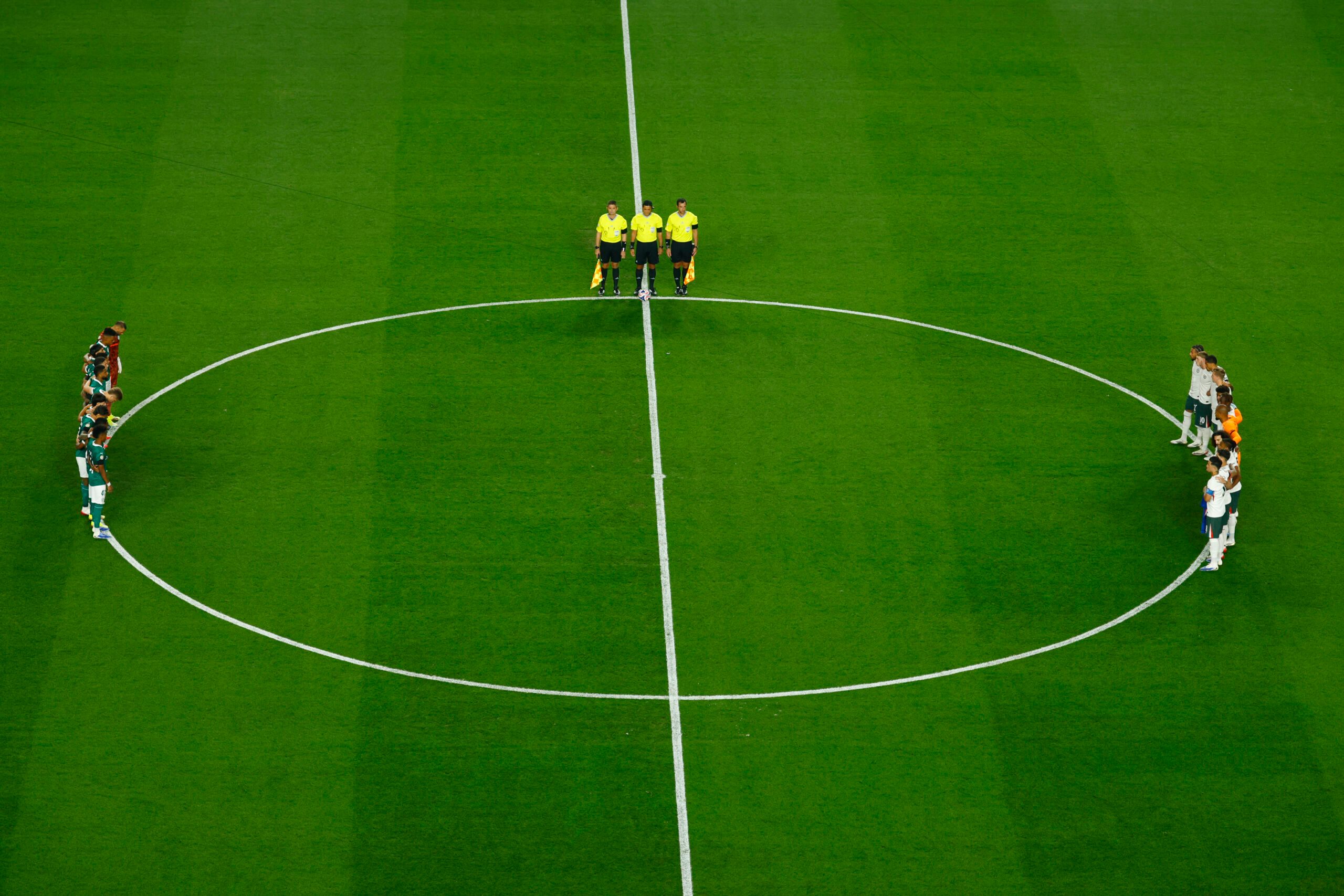 [Subscription Customers Only] Jul 4, 2025; Philadelphia, Pennsylvania, USA; The players and officials stand during a minutes silence in tribute to Liverpool forward Diogo Jota and his brother Andre Silva before a quarterfinal match of the 2025 FIFA Club World Cup at Lincoln Financial Field. Mandatory Credit: Susana Vera-Reuters via Imagn Images