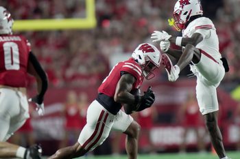 Wisconsin safety Austin Brown (9) breaks up a pass intended Miami (Ohio) wide receiver Kam Perry (8) during the first quarter August 28 Camp Randall Stadium.