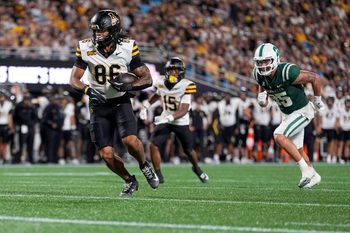 Aug 29, 2025; Charlotte, North Carolina, USA; Appalachian State Mountaineers tight end Kanen Hamlett (86) makes a catch in the red zone against the Charlotte 49ers during the second half at Bank of America Stadium. Mandatory Credit: Jim Dedmon-Imagn Images