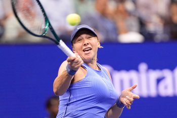 Sep 4, 2025; Flushing, NY, USA;  
Amanda Anisimova (USA) hits to Naomi Osaka (JPN) (not pictured) on day twelve of the 2025 U.S. Open tennis tournament at the USTA Billie Jean King National Tennis Center. Mandatory Credit: Robert Deutsch-Imagn Images