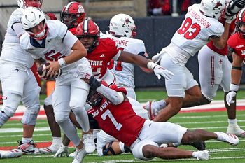 Jacksonville StateÕs Isaac Walker sacks Liberty quarterback Ethan Vasko during college school football action at AmFirst Stadium in Jacksonville, Alabama September 6, 2025. (Dave Hyatt / Hyatt Media LLC)