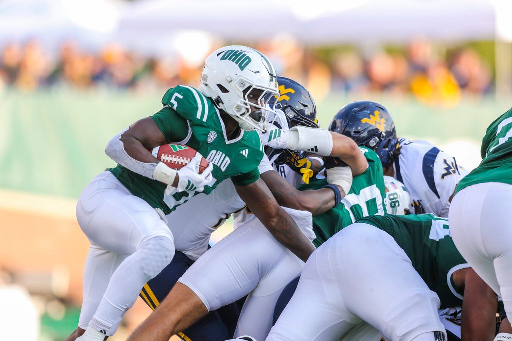 Sep 6, 2025; Athens, Ohio, USA; Ohio Bobcats running back Sieh Bangura (5) runs the ball during the third quarter against the West Virginia Mountaineers at Peden Stadium. Mandatory Credit: Ben Queen-Imagn Images