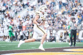 Western Michigan sophomore Broc Lowry scores a touchdown during the home-opening game against North Texas at Western Michigan University on Saturday, Sept. 6, 2025.
