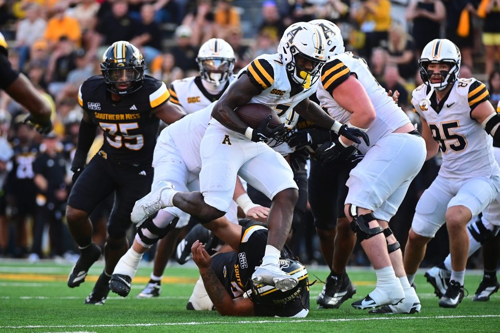 Appalachian State Mountaineers running back Rashod Dubinion (7) runs the ball against the Southern Miss Golden Eagles during the first quarter at M.M. Roberts Stadium in Hattiesburg, Miss., on Sept. 13, 2025.