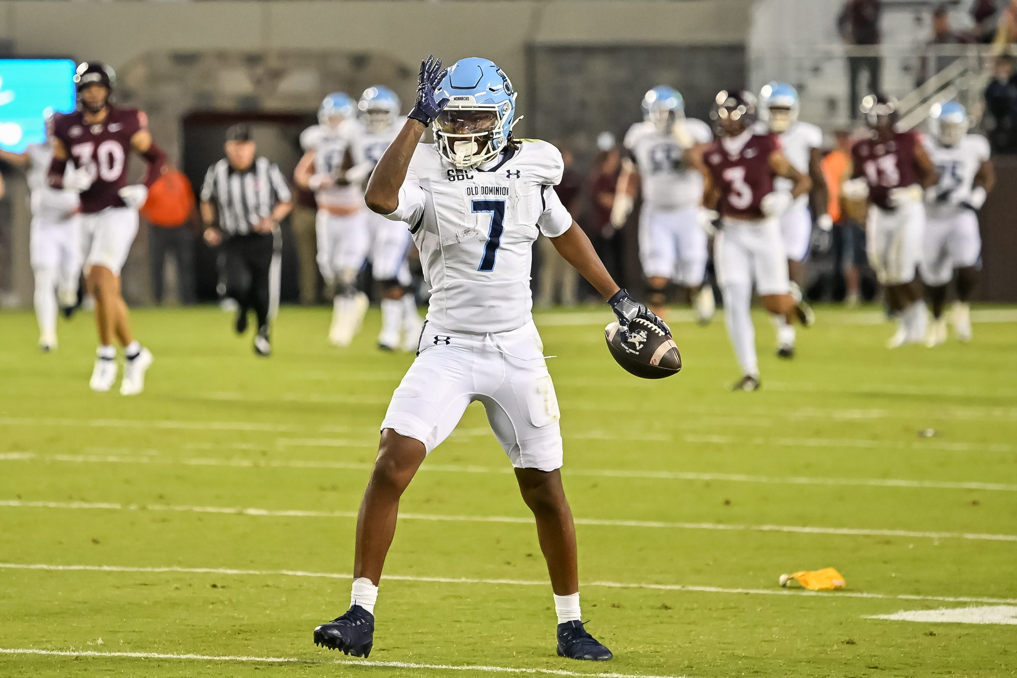 Sep 13, 2025; Blacksburg, Virginia, USA;  Old Dominion Monarchs wide receiver Na'eem Abdul-Rahim Gladding (7) celebrates a first down during the second quarter at Lane Stadium. Mandatory Credit: Brian Bishop-Imagn Images