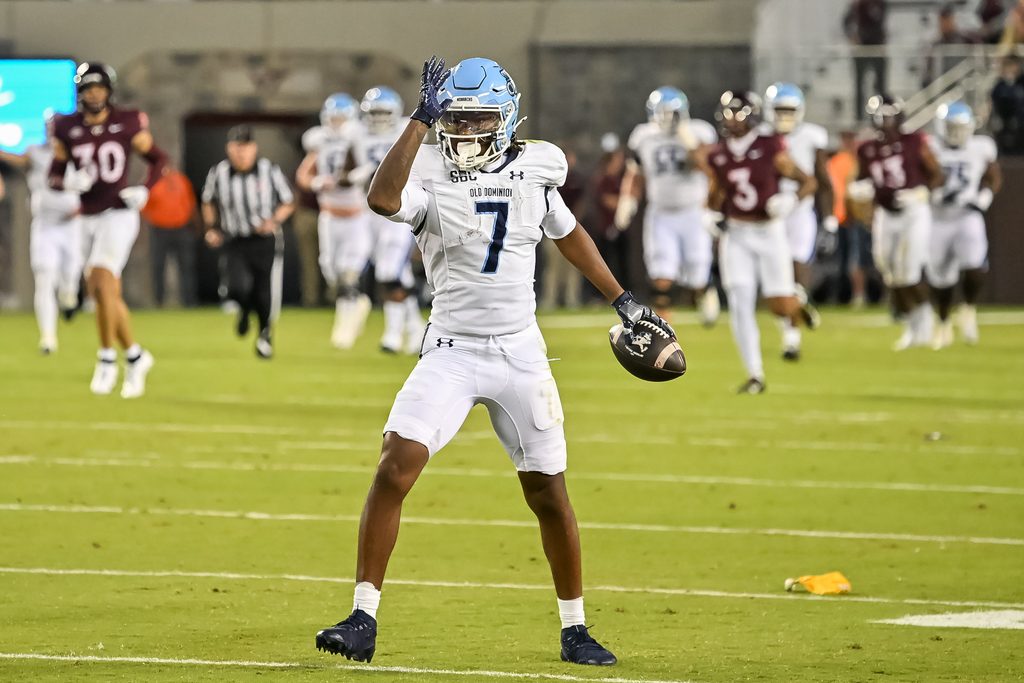 Sep 13, 2025; Blacksburg, Virginia, USA; Old Dominion Monarchs wide receiver Na'eem Abdul-Rahim Gladding (7) celebrates a first down during the second quarter at Lane Stadium. Mandatory Credit: Brian Bishop-Imagn Images