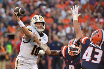 Sep 13, 2025; Champaign, Illinois, USA;  Western Michigan Broncos quarterback Brady Jones (10) passes the ball against the Illinois Fighting Illini at Memorial Stadium. Mandatory Credit: Ron Johnson-Imagn Images