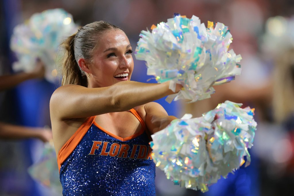 Sep 20, 2025; Miami Gardens, Florida, USA; A Florida Gators cheerleader performs during the game against the Miami Hurricanes at Hard Rock Stadium. Mandatory Credit: Sam Navarro-Imagn Images