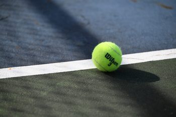 A tennis ball sits on the court at St. Clair High School on Thursday, Oct. 2, 2025.