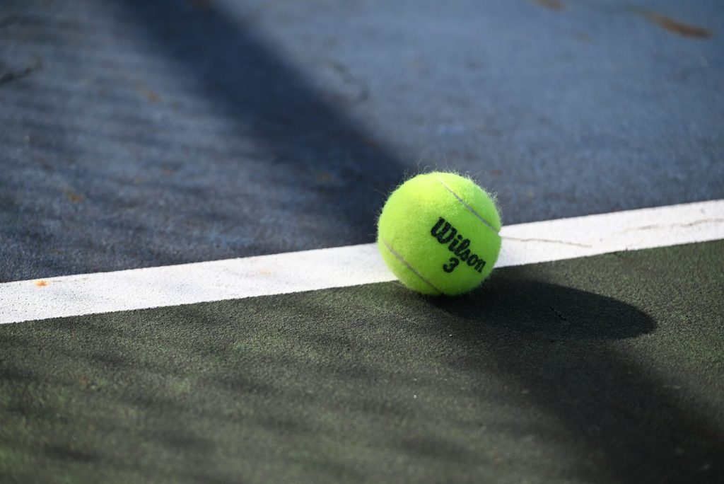 A tennis ball sits on the court at St. Clair High School on Thursday, Oct. 2, 2025.