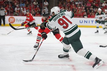 Oct 3, 2025; Chicago, Illinois, USA; Minnesota Wild right wing Vladimir Tarasenko (91) scores during the second period against the Chicago Blackhawks at United Center. Mandatory Credit: Talia Sprague-Imagn Images