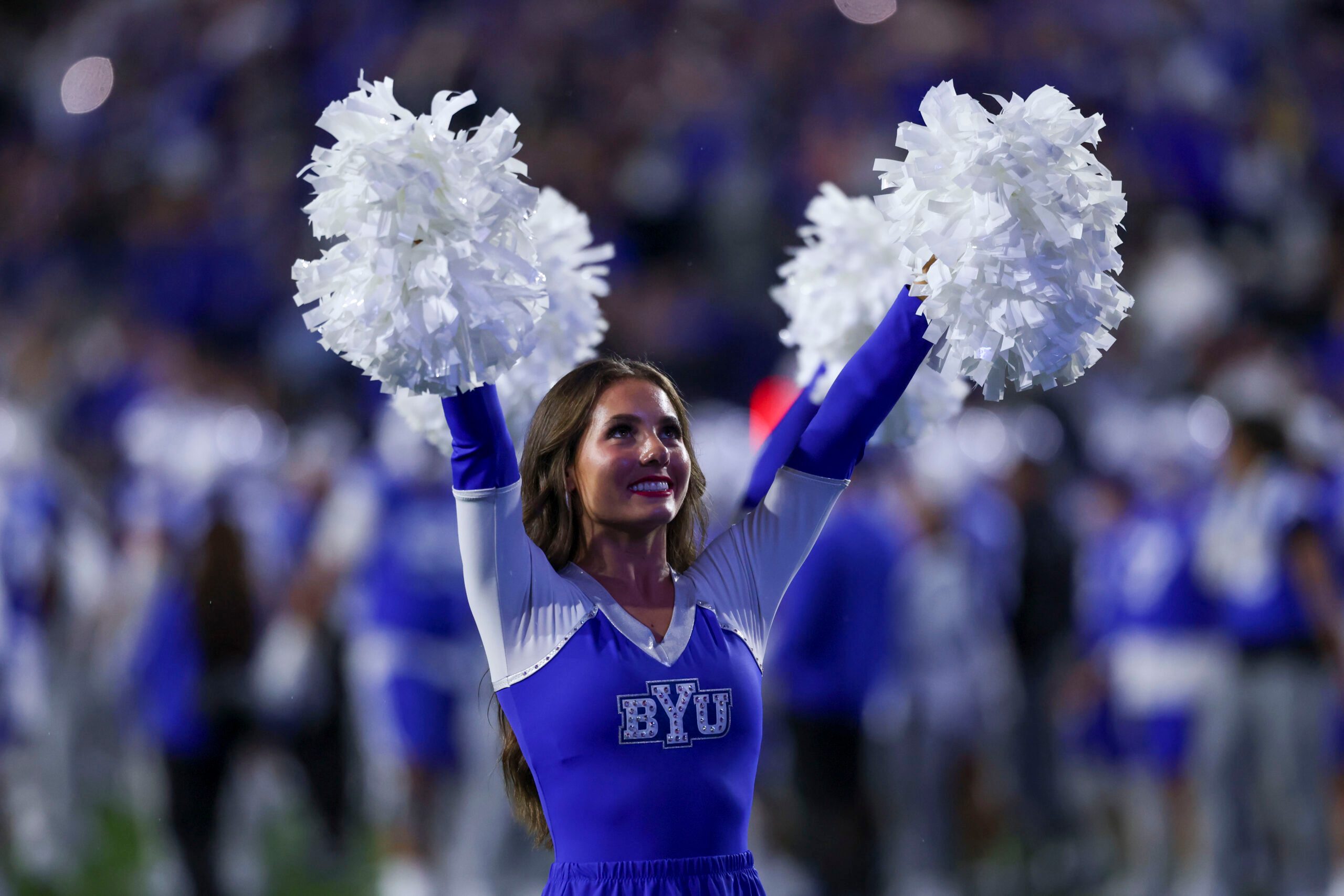 Oct 3, 2025; Provo, Utah, USA; A. Brigham Young Cougars cheerleader performs between the third and fourth quarter of the game against the West Virginia Mountaineers at LaVell Edwards Stadium. Mandatory Credit: Rob Gray-Imagn Images