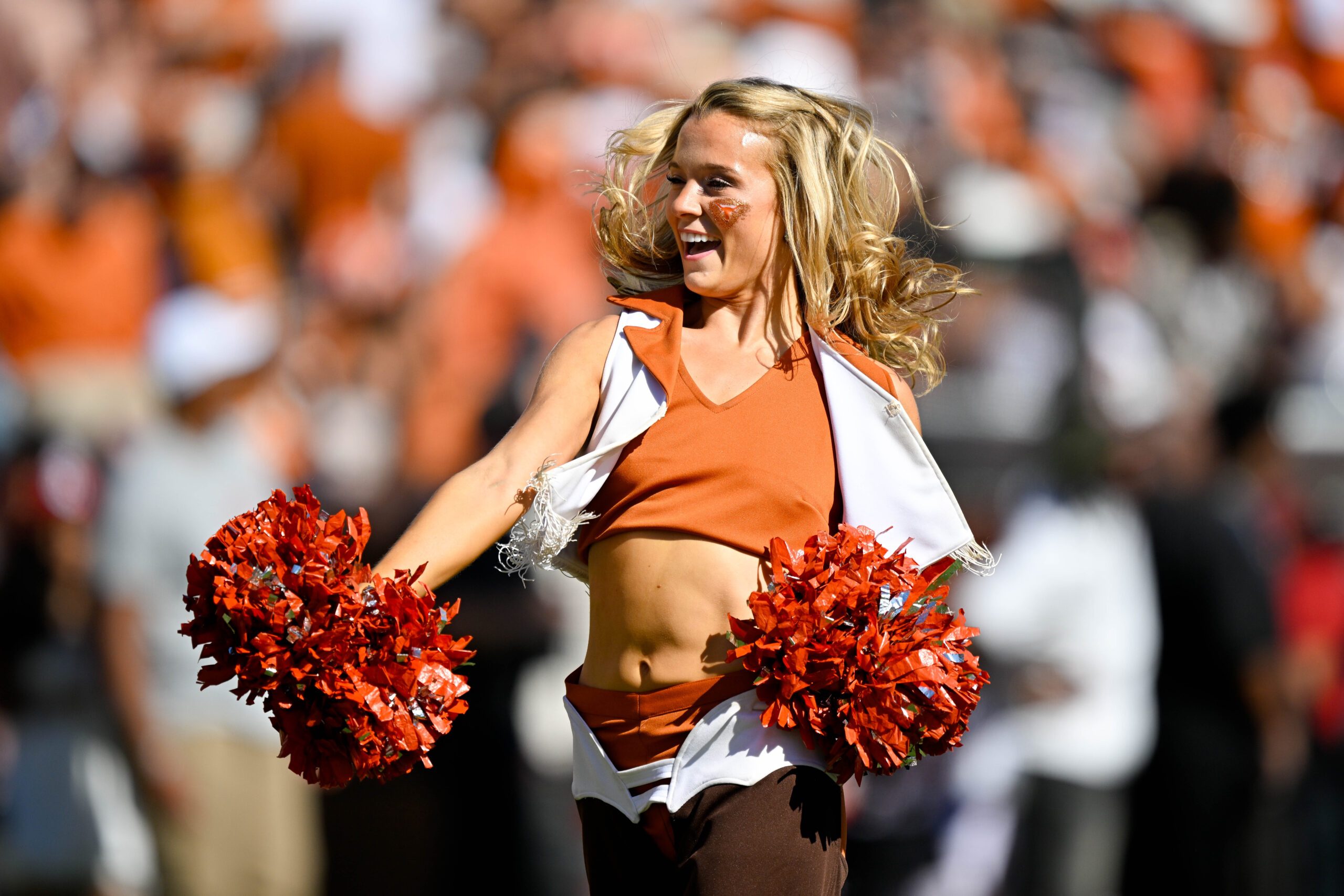 Oct 11, 2025; Dallas, Texas, USA; The Texas Longhorns cheerleaders perform during the first half against the Oklahoma Sooners at the Cotton Bowl. Mandatory Credit: Jerome Miron-Imagn Images