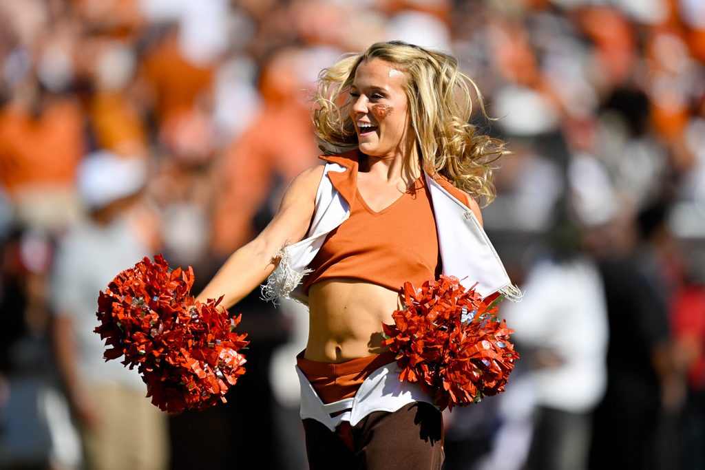 Oct 11, 2025; Dallas, Texas, USA; The Texas Longhorns cheerleaders perform during the first half against the Oklahoma Sooners at the Cotton Bowl. Mandatory Credit: Jerome Miron-Imagn Images