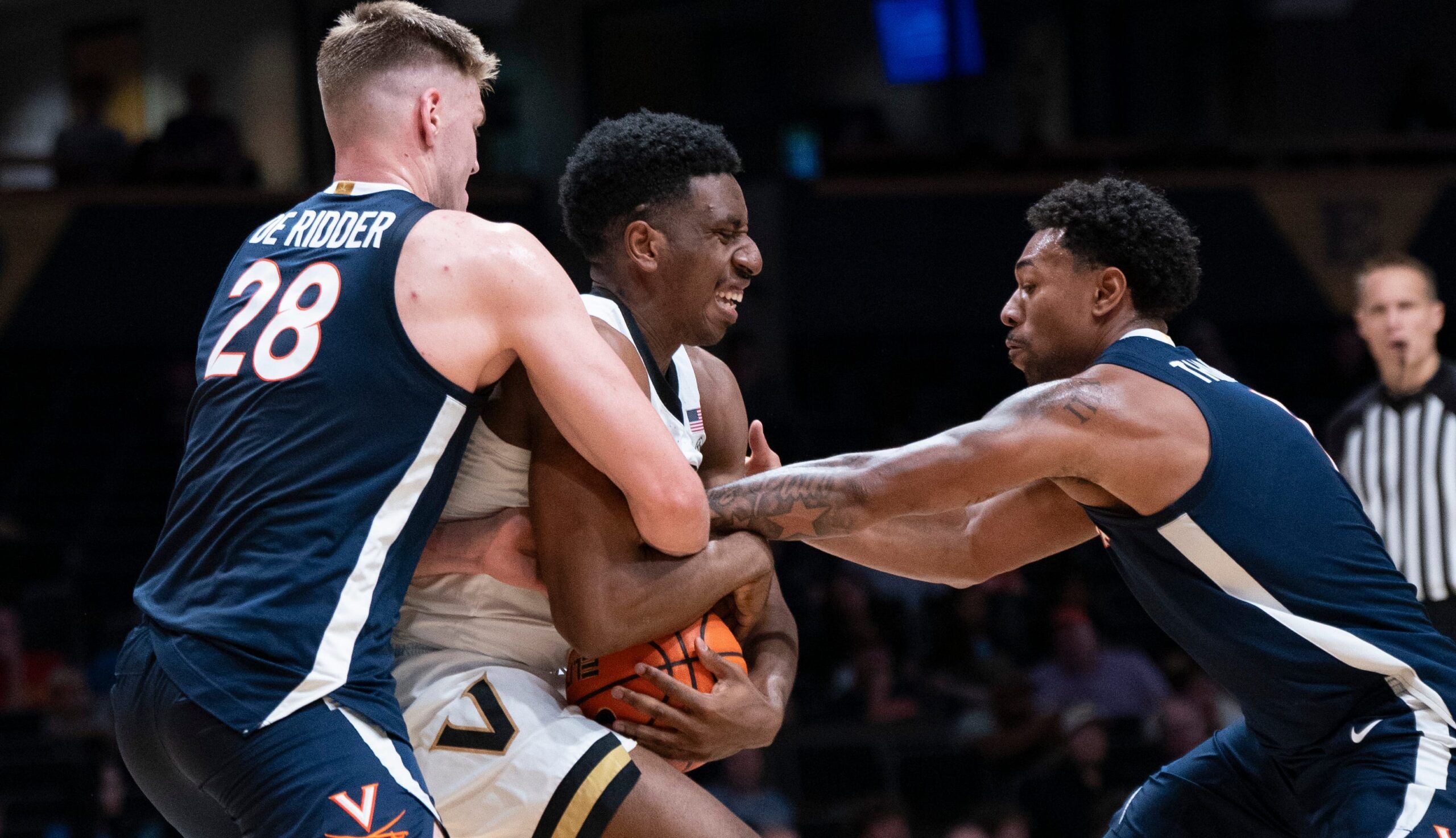 Virginia forward Thijs De Ridder (28) and guard Malik Thomas (1) trap Vanderbilt forward AK Okereke (10) during the second half of their exhibition game at Memorial Gym in Nashville, Tenn., Thursday, Oct. 16, 2025.