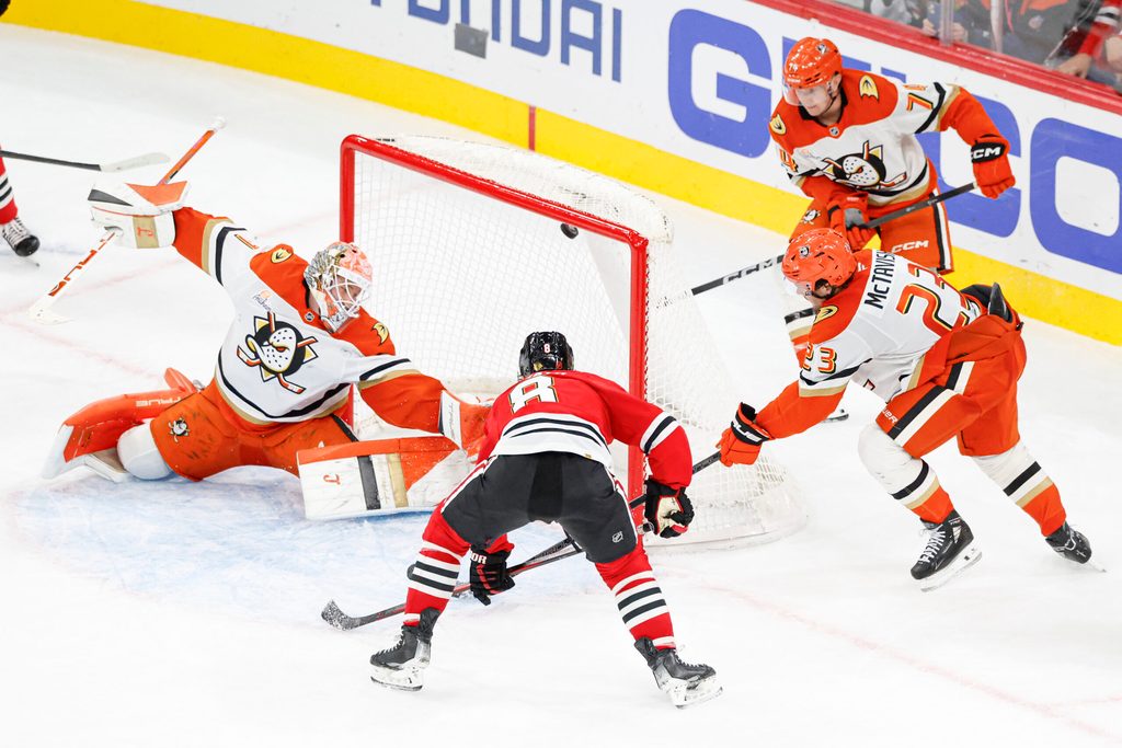 Oct 19, 2025; Chicago, Illinois, USA; Chicago Blackhawks center Ryan Donato (8) scores in overtime a game winning goal against the Anaheim Ducks at United Center. Mandatory Credit: Kamil Krzaczynski-Imagn Images