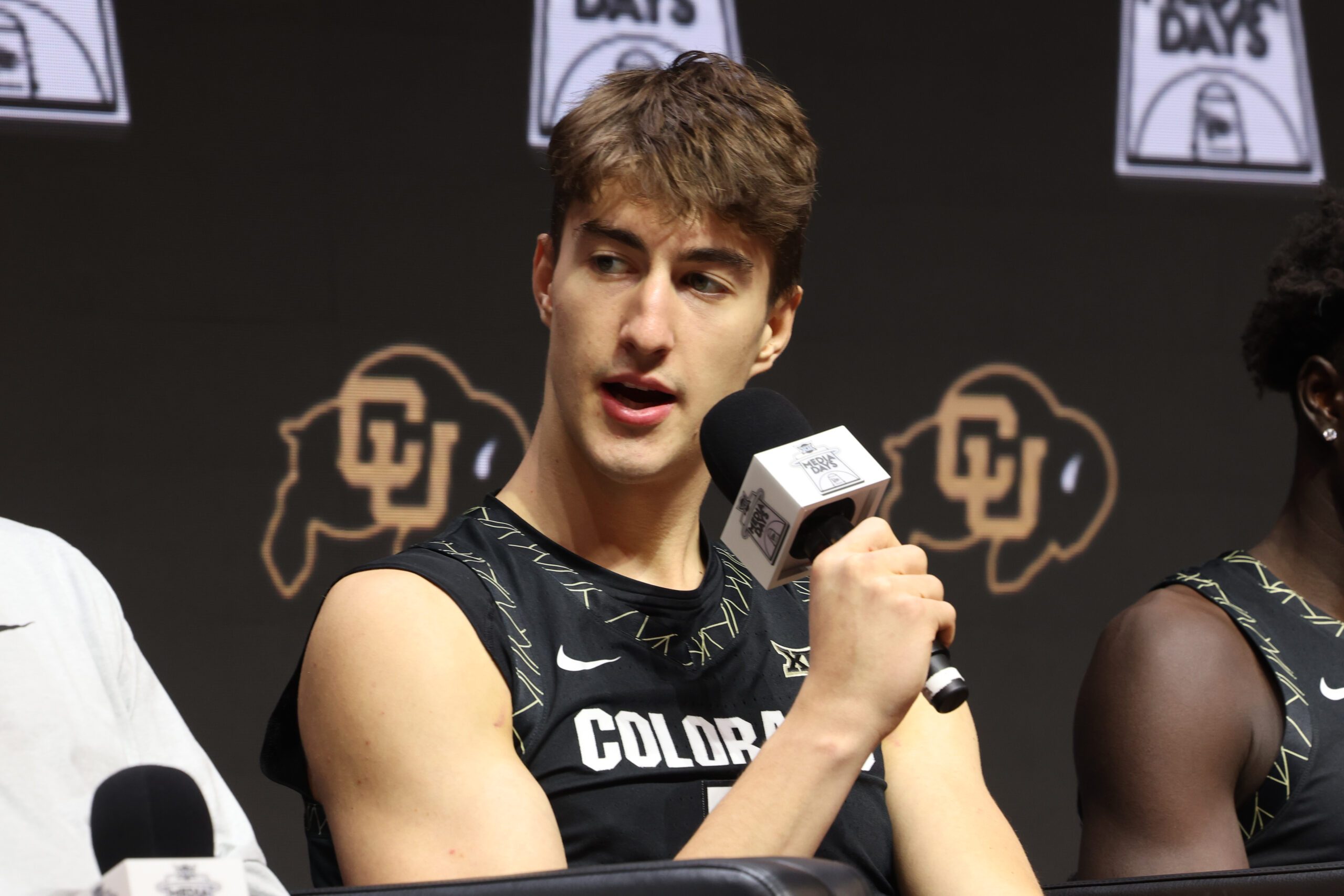 Oct 22, 2025; Kansas City, MO, USA; Colorados Sebastian Rancik speaks to media during Big 12 Menís Basketball media day at T-Mobile Center. Mandatory Credit: Sophia Scheller-Imagn Images