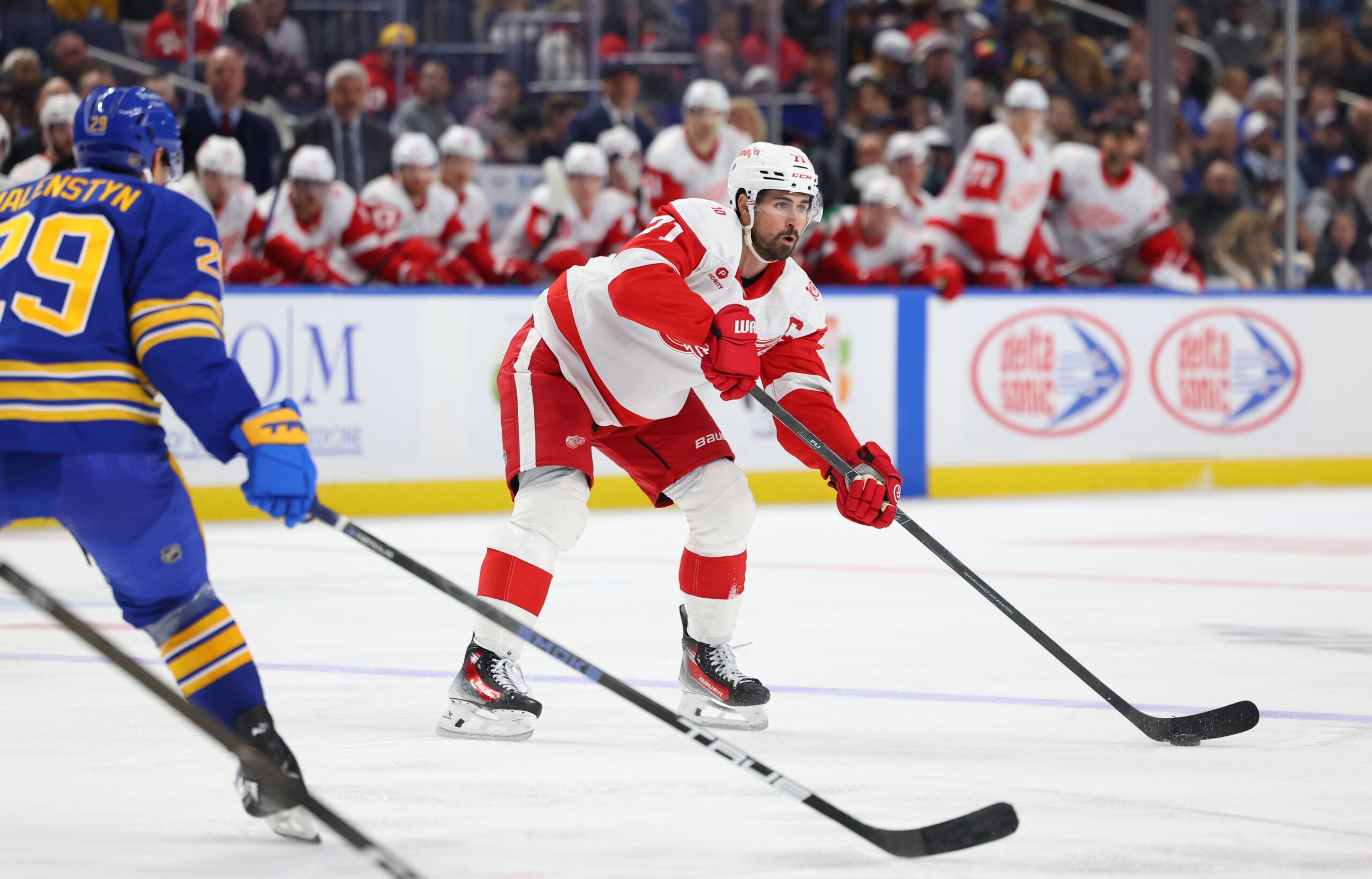 Oct 22, 2025; Buffalo, New York, USA;  Detroit Red Wings center Dylan Larkin (71) makes a pass during the third period against the Buffalo Sabres at KeyBank Center. Mandatory Credit: Timothy T. Ludwig-Imagn Images