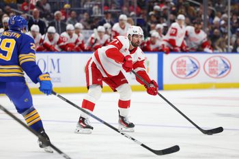 Oct 22, 2025; Buffalo, New York, USA;  Detroit Red Wings center Dylan Larkin (71) makes a pass during the third period against the Buffalo Sabres at KeyBank Center. Mandatory Credit: Timothy T. Ludwig-Imagn Images