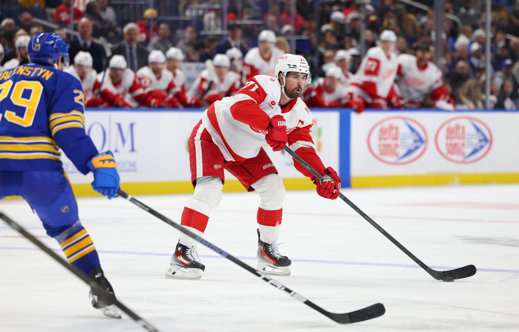 Oct 22, 2025; Buffalo, New York, USA; Detroit Red Wings center Dylan Larkin (71) makes a pass during the third period against the Buffalo Sabres at KeyBank Center. Mandatory Credit: Timothy T. Ludwig-Imagn Images