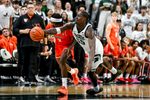 Michigan State's Coen Carr, right, and Bowling Green's Javontae Campbell go after a ball after Carr blocks Campbell's shot during the second half on Thursday, Oct. 23, 2025, at the Breslin Center in East Lansing.