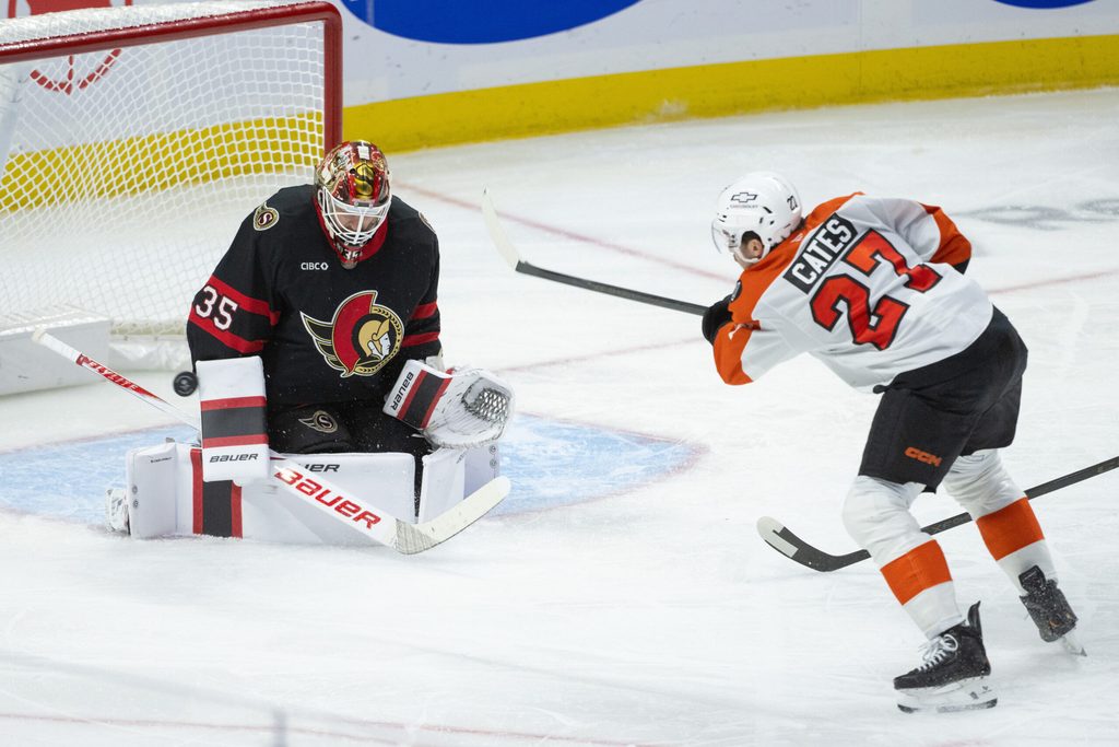 Oct 23, 2025; Ottawa, Ontario, CAN; Ottawa Senators goalie Linus Ullmark (35) makes a save on a shot from Philadelphia Flyers left wing Noah Cates (27) in the third period at the Canadian Tire Centre. Mandatory Credit: Marc DesRosiers-IMAGN Images