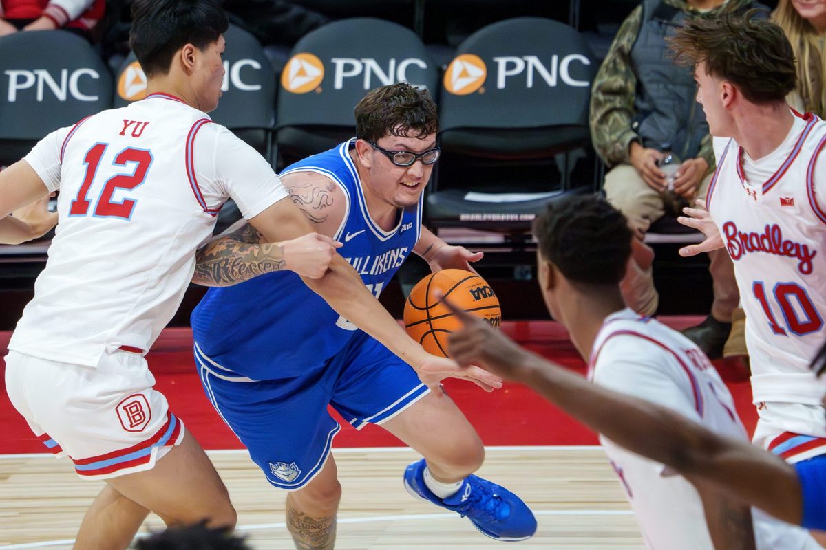 St. Louis' Robbie Avila tries to move through the Bradley defense during their exhibition game Thursday, Oct. 23, 2025 at Carver Arena.