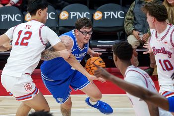 St. Louis' Robbie Avila tries to move through the Bradley defense during their exhibition game Thursday, Oct. 23, 2025 at Carver Arena.