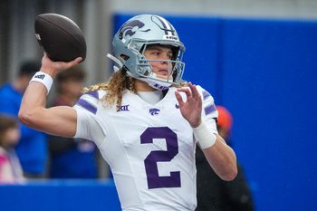 Oct 25, 2025; Lawrence, Kansas, USA; Kansas State Wildcats quarterback Avery Johnson (2) warms up against the Kansas Jayhawks prior to a game at David Booth Kansas Memorial Stadium. Mandatory Credit: Denny Medley-Imagn Images