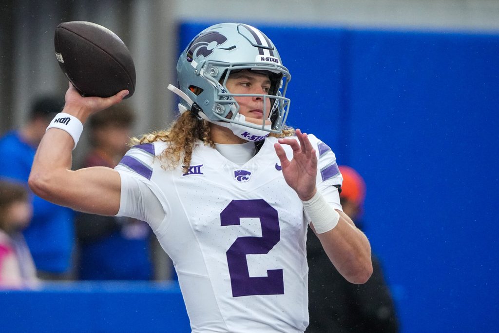 Oct 25, 2025; Lawrence, Kansas, USA; Kansas State Wildcats quarterback Avery Johnson (2) warms up against the Kansas Jayhawks prior to a game at David Booth Kansas Memorial Stadium. Mandatory Credit: Denny Medley-Imagn Images