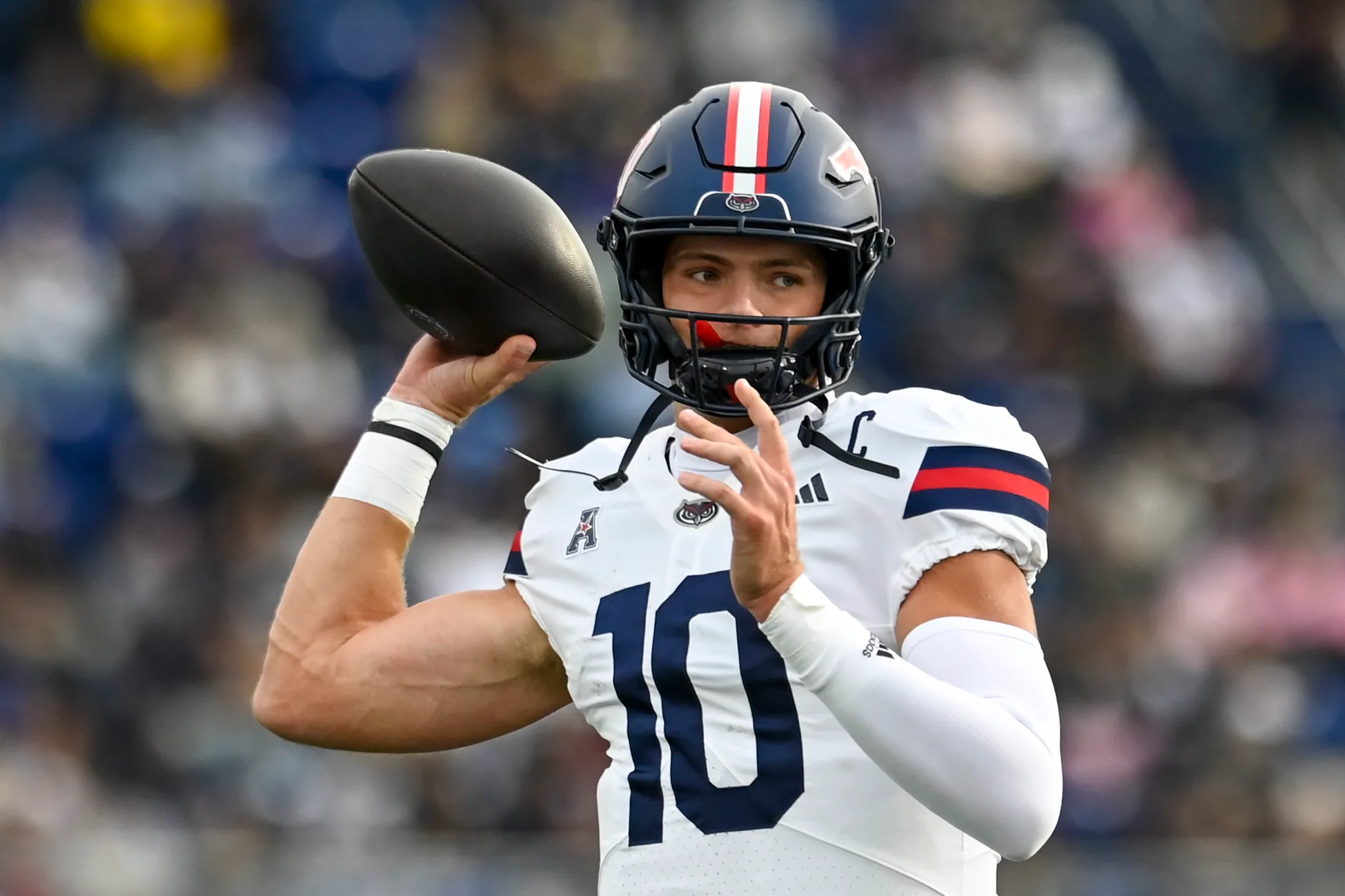 Oct 25, 2025; Annapolis, Maryland, USA;  Florida Atlantic Owls quarterback Caden Veltkamp (10) throws during the first half against the Navy Midshipmen at Navy-Marine Corps Memorial Stadium. Mandatory Credit: Tommy Gilligan-Imagn Images