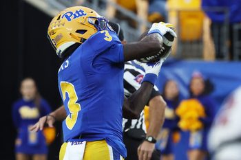 Oct 25, 2025; Pittsburgh, Pennsylvania, USA;  Pittsburgh Panthers wide receiver Cataurus Hicks (3) catches a pass and runs for a touchdown against the North Carolina State Wolfpack during the third quarter at Acrisure Stadium. Mandatory Credit: Charles LeClaire-Imagn Images