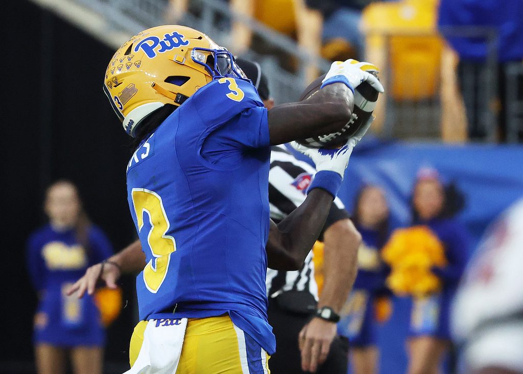 Oct 25, 2025; Pittsburgh, Pennsylvania, USA; Pittsburgh Panthers wide receiver Cataurus Hicks (3) catches a pass and runs for a touchdown against the North Carolina State Wolfpack during the third quarter at Acrisure Stadium. Mandatory Credit: Charles LeClaire-Imagn Images