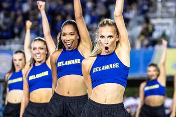 Delaware cheerleaders perform to a packed house and in front of a national TV audience during the Delaware Blue Hens first home CUSA football game vs. Western Kentucky at Delaware Stadium in Newark on Oct. 3, 2025.ÊWestern Kentucky won 27-24.