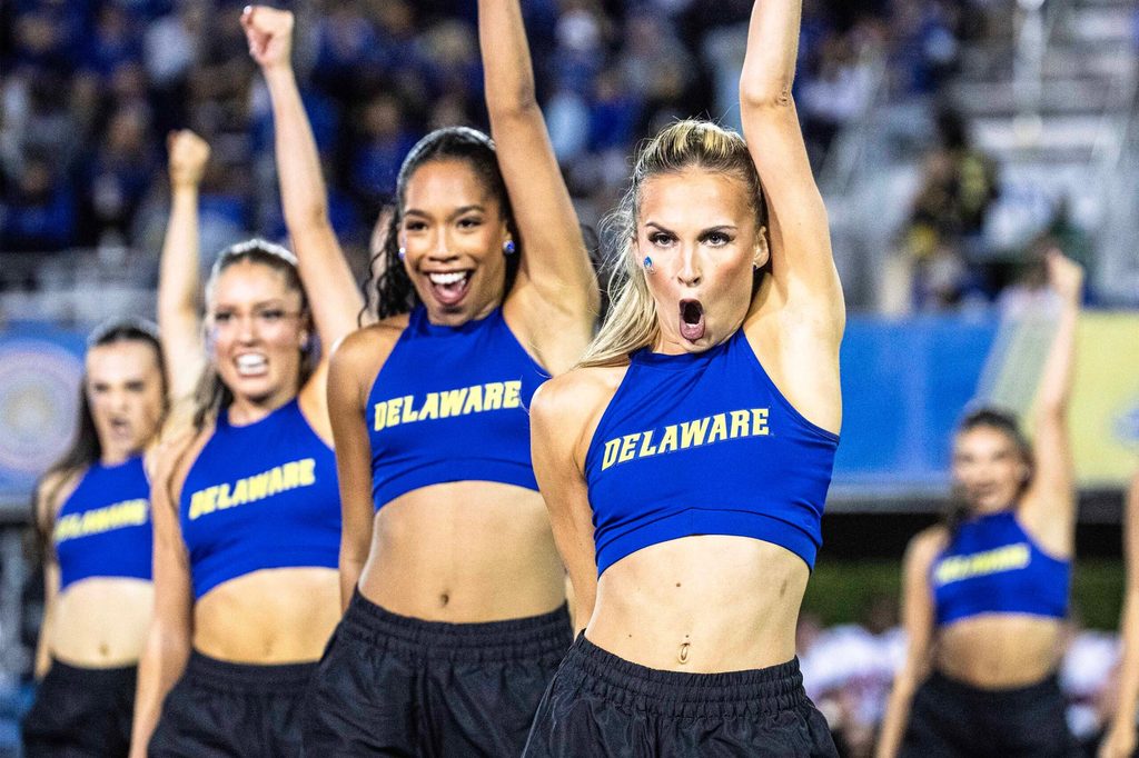 Delaware cheerleaders perform to a packed house and in front of a national TV audience during the Delaware Blue Hens first home CUSA football game vs. Western Kentucky at Delaware Stadium in Newark on Oct. 3, 2025.ÊWestern Kentucky won 27-24.