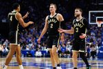 Oct 24, 2025; Lexington, KY, USA; Purdue Boilermakers guard Fletcher Loyer (2), guard Braden Smith (3) and forward Trey Kaufman-Renn (4) huddle up during the first half against the Kentucky Wildcats at Rupp Arena at Central Bank Center. Mandatory Credit: Jordan Prather-Imagn Images