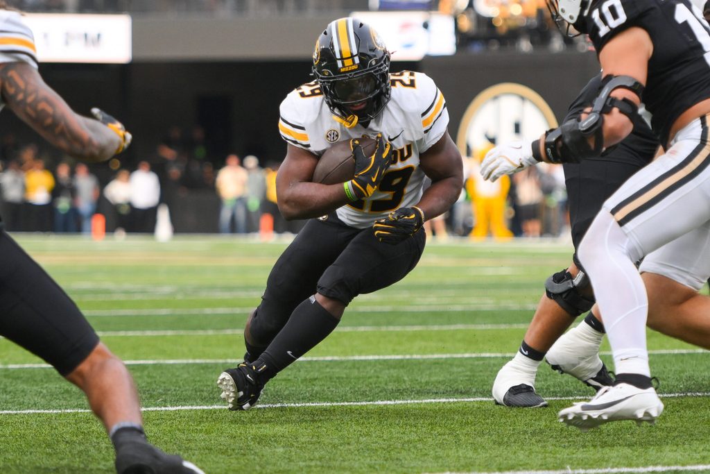 Oct 25, 2025; Nashville, Tennessee, USA; Missouri Tigers running back Ahmad Hardy (29) runs with the ball against the Vanderbilt Commodores during the first half at FirstBank Stadium. Mandatory Credit: Steve Roberts-Imagn Images