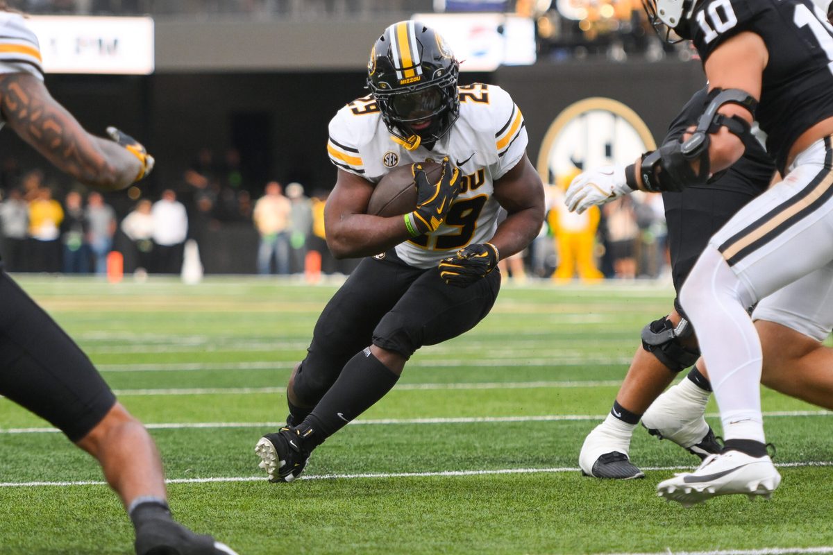 Oct 25, 2025; Nashville, Tennessee, USA; Missouri Tigers running back Ahmad Hardy (29) runs with the ball against the Vanderbilt Commodores during the first half at FirstBank Stadium. Mandatory Credit: Steve Roberts-Imagn Images