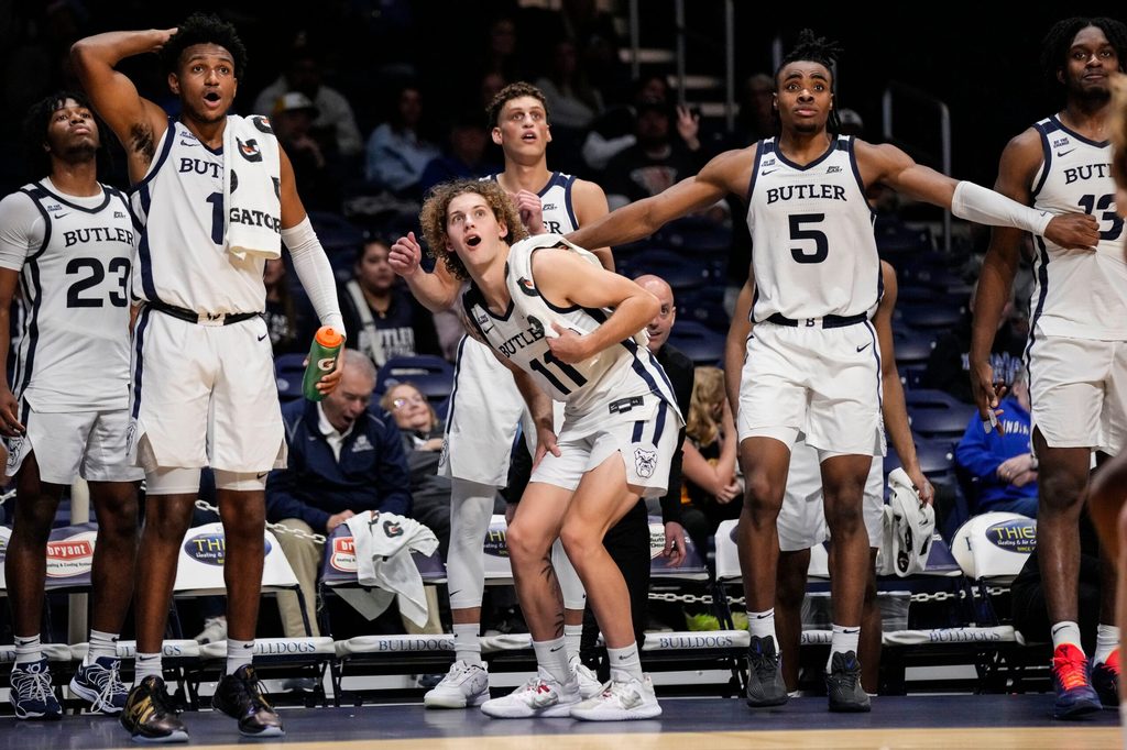 Butler Bulldogs guard Evan Haywood (1), Butler Bulldogs guard Finley Bizjack (11) and Butler Bulldogs forward Michael Ajayi (5) watch from the sidelines on Wednesday, Oct. 29, 2025, during the game at Hinkle Fieldhouse in Indianapolis. The Butler Bulldogs defeated the Indiana State Sycamores, 105-80.