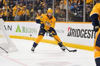 Oct 26, 2025; Nashville, Tennessee, USA;  Nashville Predators center Ryan O'Reilly (90) skates behind the net against the Dallas Stars during the third period at Bridgestone Arena. Mandatory Credit: Steve Roberts-Imagn Images