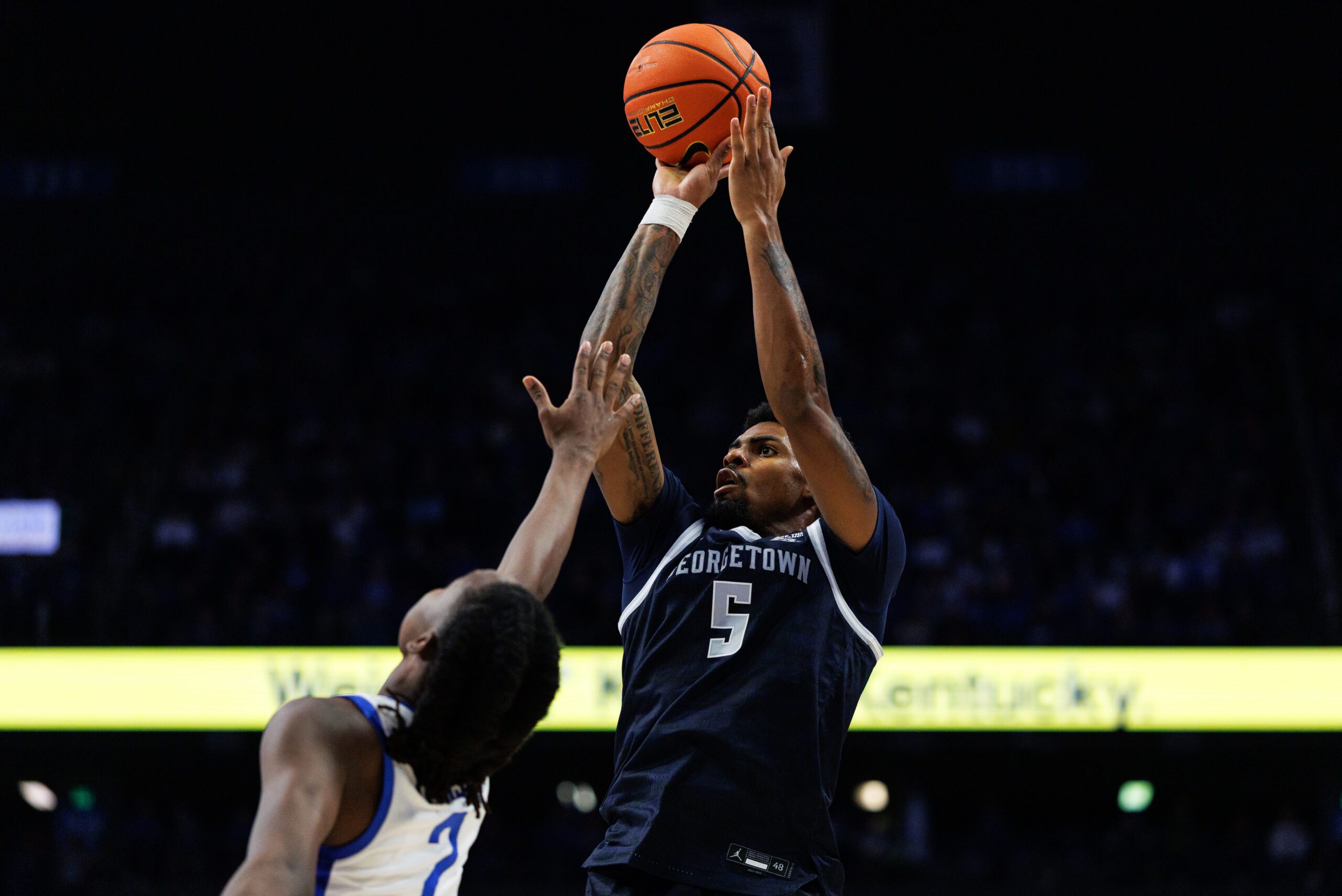 Oct 30, 2025; Lexington, KY, USA; Georgetown Hoyas guard Kj Lewis (5) shoots the ball during the first half against the Kentucky Wildcats at Rupp Arena at Central Bank Center. Mandatory Credit: Jordan Prather-Imagn Images