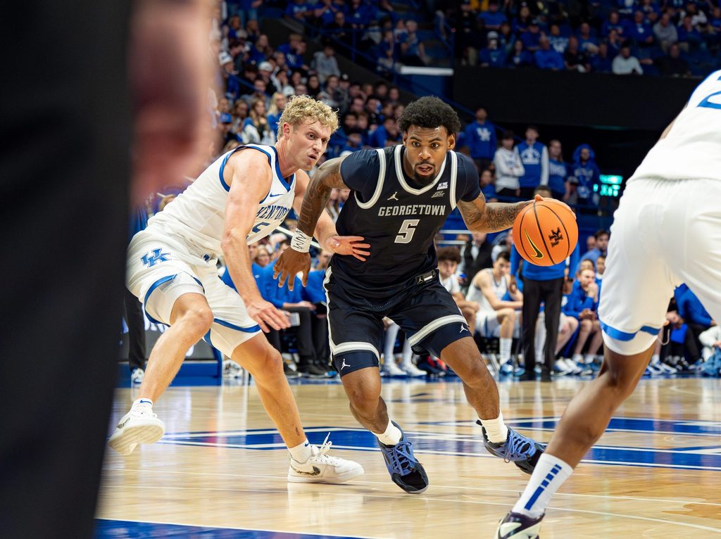 Georgetown’s KJ Lewis (5) drove to the basket for a score as the Kentucky Wildcats host the Georgetown Hoyas at Rupp Arena in Lexington on Thursday, Oct. 30, 2025.