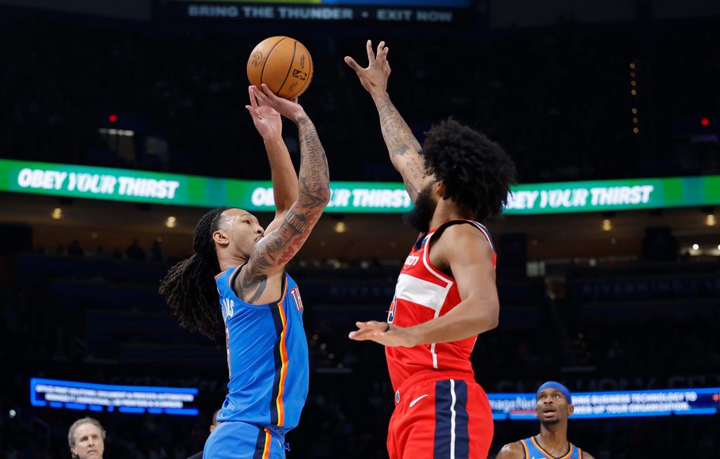 Oct 30, 2025; Oklahoma City, Oklahoma, USA; Oklahoma City Thunder forward Jaylin Williams (6) shoots over Washington Wizards forward Marvin Bagley III (35) during the second half at Paycom Center. Mandatory Credit: Alonzo Adams-Imagn Images