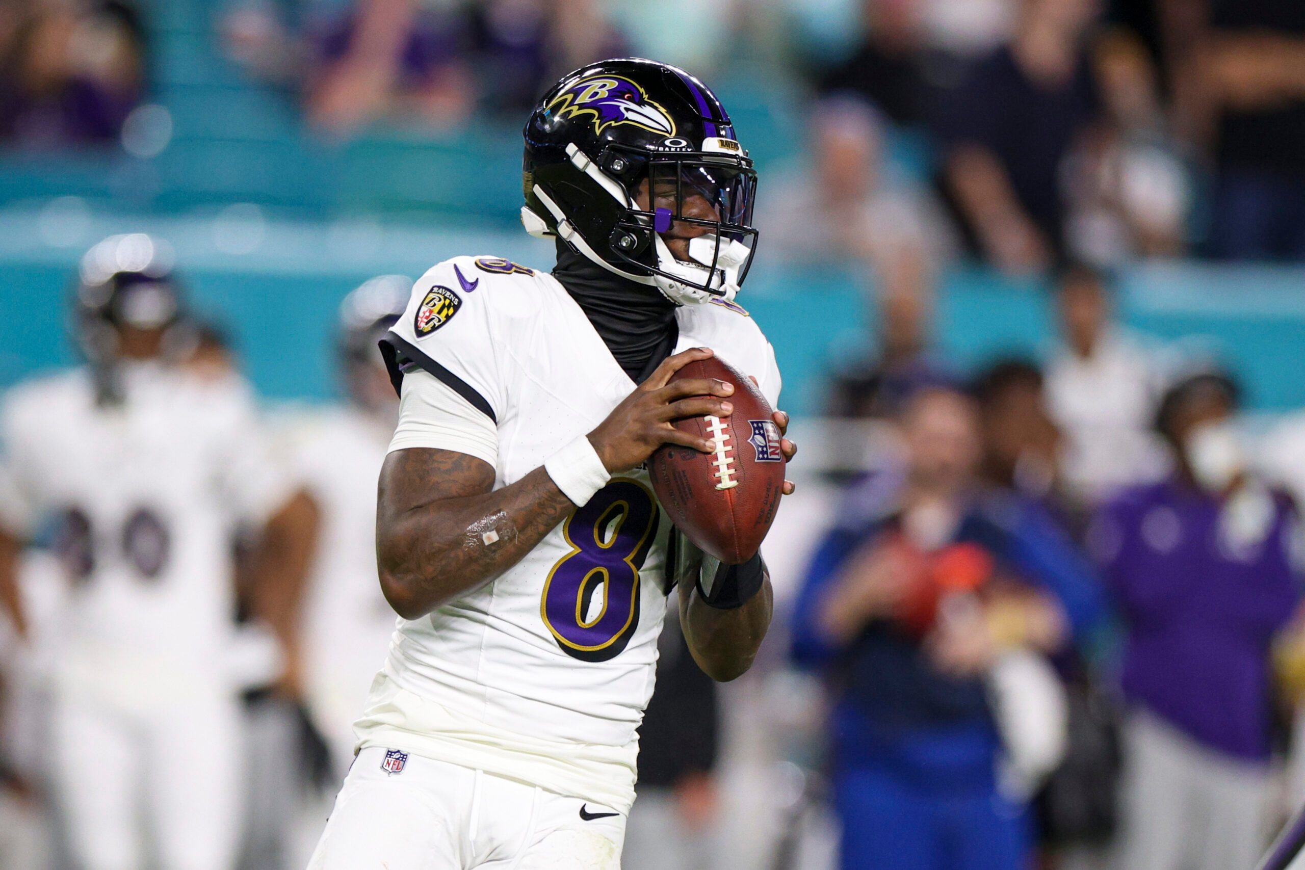 Oct 30, 2025; Miami Gardens, Florida, USA; Baltimore Ravens quarterback Lamar Jackson (8) looks to pass against the Miami Dolphins in the third quarter at Hard Rock Stadium. Mandatory Credit: Nathan Ray Seebeck-Imagn Images